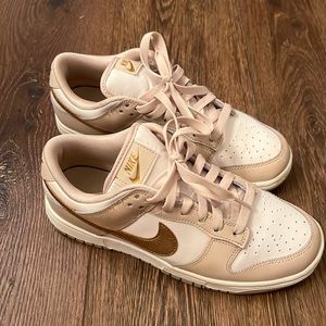Women’s gold swoosh Nike dunks size 7